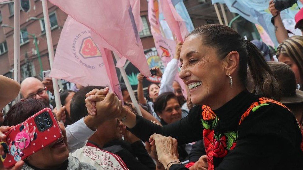 Former Mexico City Mayor Claudia Sheinbaum greets supporters during an event